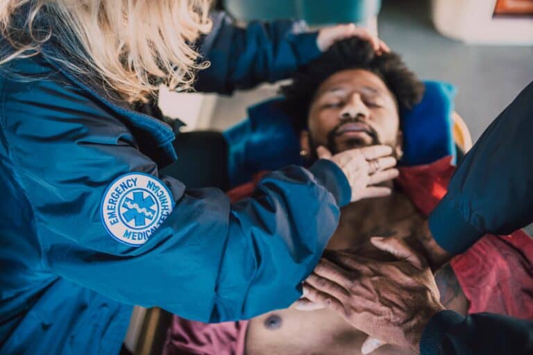 Emergency medical response explaining CPR vs. first aid.