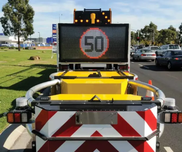Truck-mounted attenuator MA truck with electronic speed sign used for traffic control and road safety in Queensland civil construction