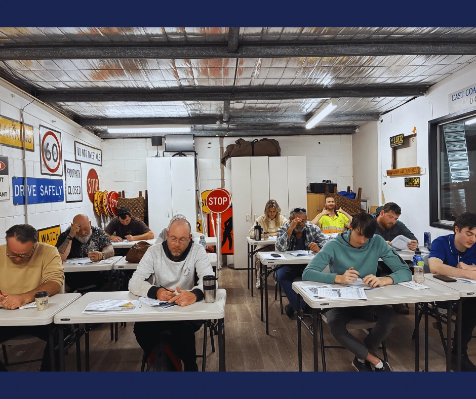 Participants completing TC & TMI in Sunshine Coast theory training with Upskills QLD, learning traffic control and traffic management procedures in a classroom environment.